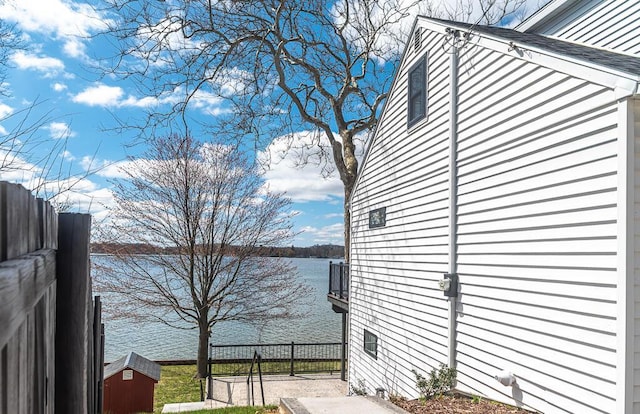 water view featuring fence