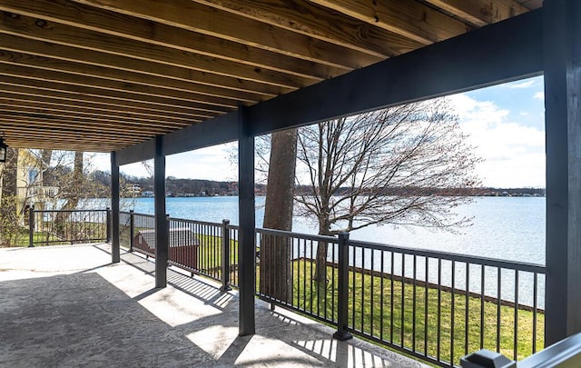 view of patio featuring a water view