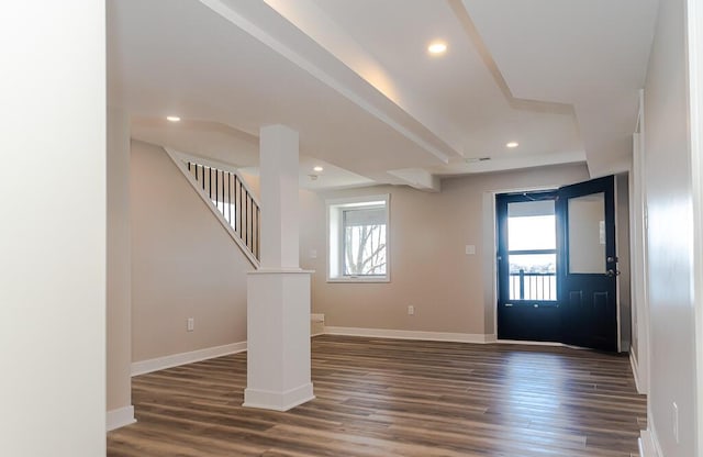 foyer featuring healthy amount of natural light, dark wood finished floors, baseboards, and recessed lighting
