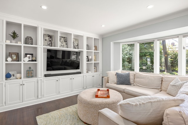 living room featuring ornamental molding, dark wood-type flooring, and recessed lighting