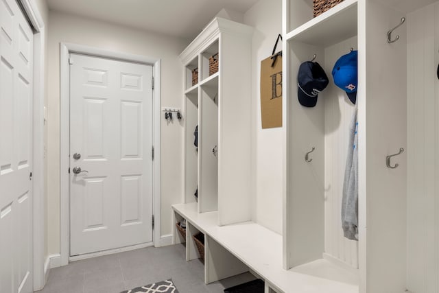 mudroom with light tile patterned floors