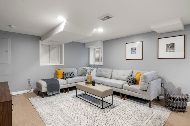 carpeted living room with baseboards and recessed lighting
