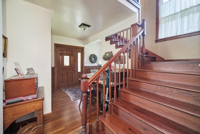 1621 W Beyer Rd, Ludington, MI 49431 - foyer featuring stairs and wood finished floors