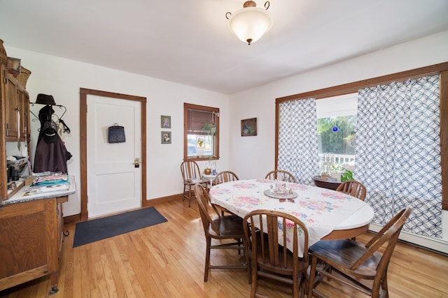 1621 W Beyer Rd, Ludington, MI 49431 - dining area featuring light wood-type flooring and baseboards