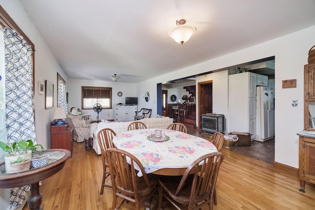 1621 W Beyer Rd, Ludington, MI 49431 - dining area featuring light wood finished floors and stairway
