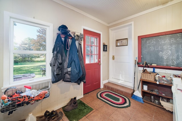 1621 W Beyer Rd, Ludington, MI 49431 - tiled foyer with plenty of natural light and crown molding