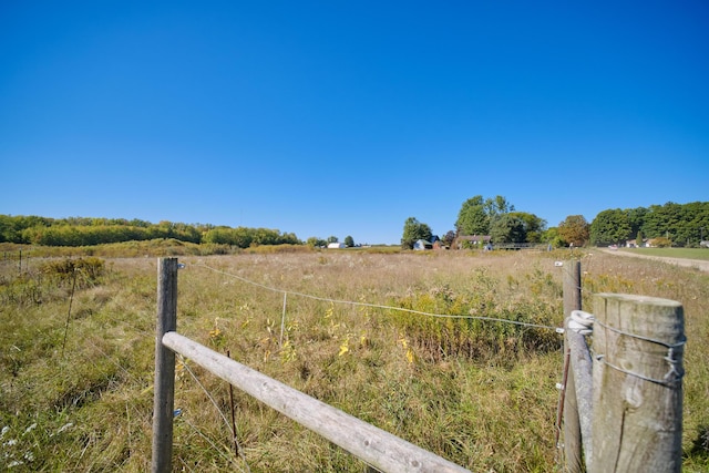 1621 W Beyer Rd, Ludington, MI 49431 - view of yard featuring fence and a view of countryside