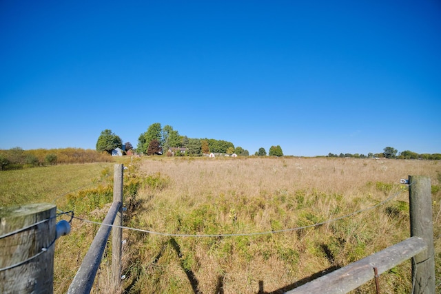 1621 W Beyer Rd, Ludington, MI 49431 - view of yard featuring a view of rural / pastoral area and fence