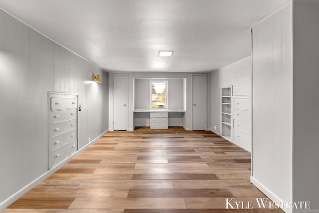 405 S 1st St, Edmore, MI 48829 - unfurnished bedroom featuring light wood-type flooring