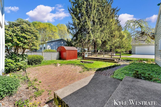 405 S 1st St, Edmore, MI 48829 - view of yard featuring an outdoor structure and a storage shed