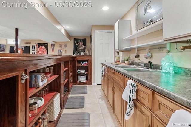 9450 Sandlewood Ct, Whitmore Lake, MI 48189 - kitchen with a sink, open shelves, light tile patterned floors, recessed lighting, and dark countertops