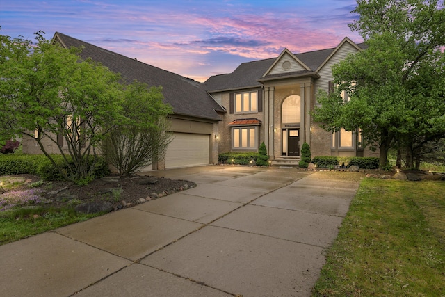 11638 Chandler Dr, Plymouth, MI 48170 - traditional home featuring driveway, an attached garage, and roof with shingles
