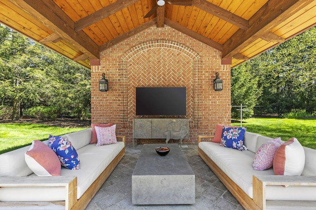 view of patio / terrace featuring an outdoor living space with a fireplace