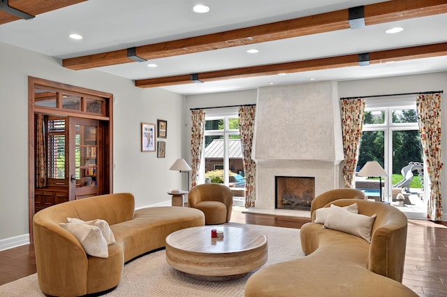 living room with baseboards, recessed lighting, hardwood / wood-style flooring, beamed ceiling, and a high end fireplace