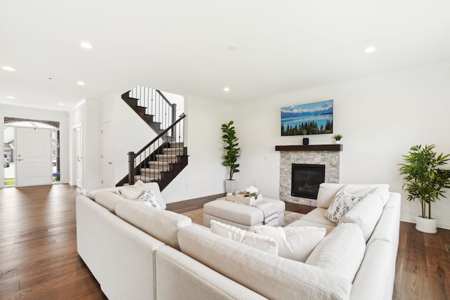 49793 Split Rock Rd, Macomb, MI 48044 - living room featuring stairway, baseboards, dark wood-style flooring, recessed lighting, and crown molding