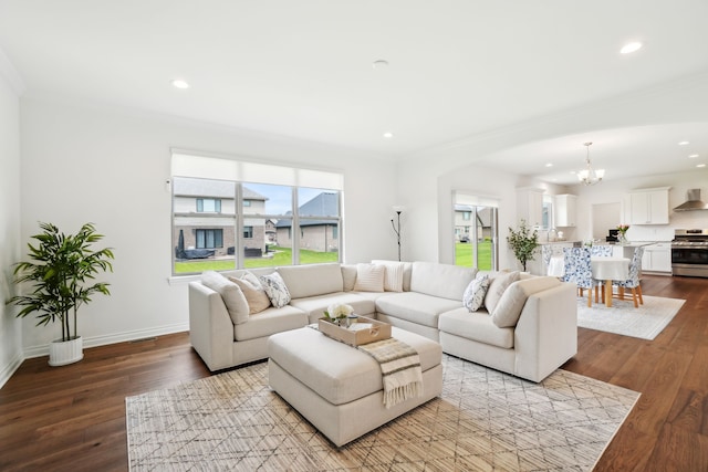 49793 Split Rock Rd, Macomb, MI 48044 - living room with a chandelier, crown molding, wood finished floors, baseboards, and recessed lighting