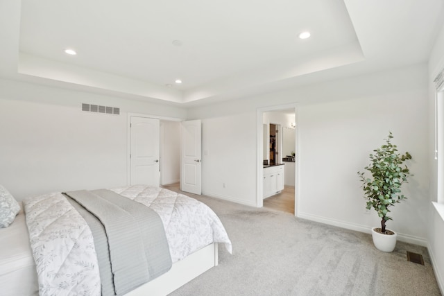 49793 Split Rock Rd, Macomb, MI 48044 - bedroom with a tray ceiling, light colored carpet, recessed lighting, baseboards, and ensuite bath