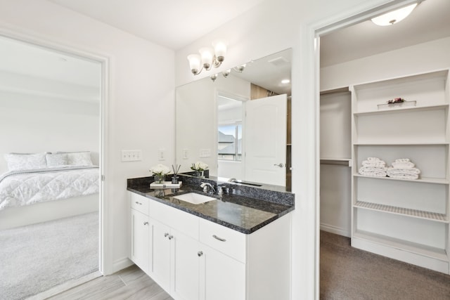 49793 Split Rock Rd, Macomb, MI 48044 - full bathroom with vanity and connected bathroom