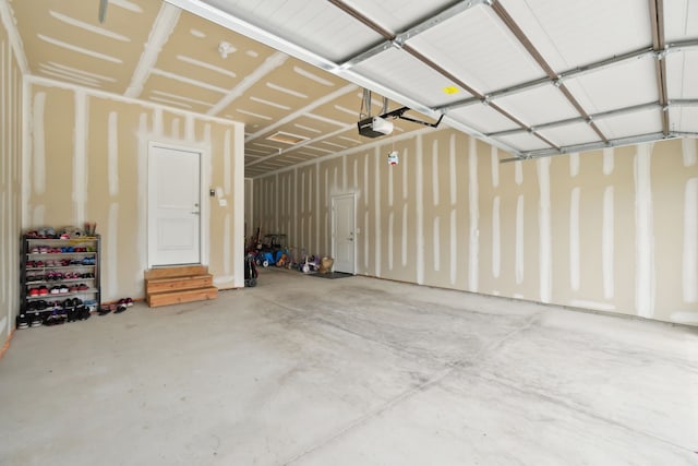 49793 Split Rock Rd, Macomb, MI 48044 - garage featuring a garage door opener