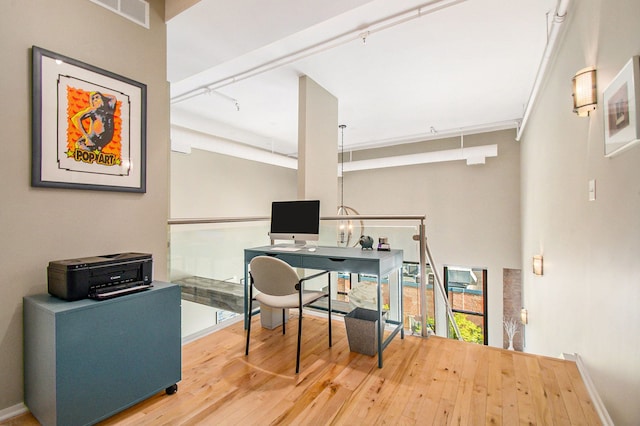 101 W Liberty St Unit 320, Ann Arbor, MI 48104 - office area with wood finished floors and rail lighting