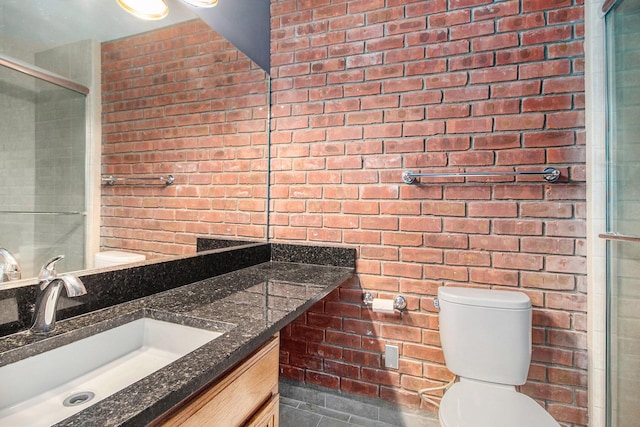 full bathroom with toilet, vanity, tile patterned floors, and a shower with shower door