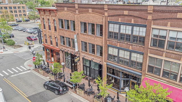 view of property featuring uncovered parking