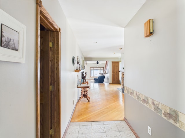 480 Peninsula Dr, Columbiaville, MI 48421 - hall with light marble finish flooring and baseboards