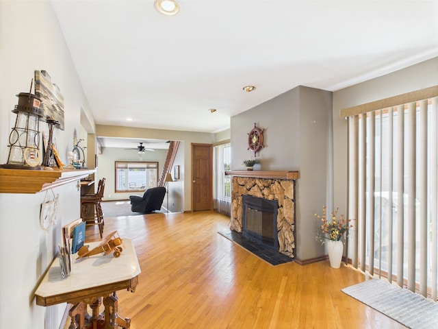 480 Peninsula Dr, Columbiaville, MI 48421 - living area featuring a fireplace, light wood-type flooring, ceiling fan, recessed lighting, and baseboards