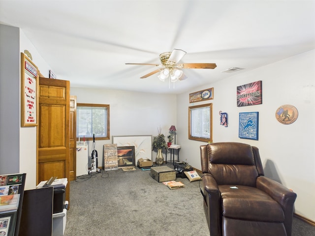 480 Peninsula Dr, Columbiaville, MI 48421 - living area with carpet floors and a ceiling fan