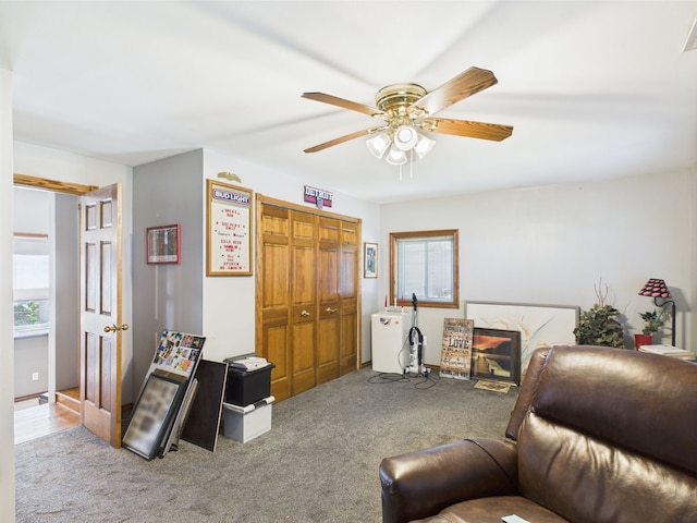 480 Peninsula Dr, Columbiaville, MI 48421 - sitting room with carpet flooring, plenty of natural light, and a ceiling fan