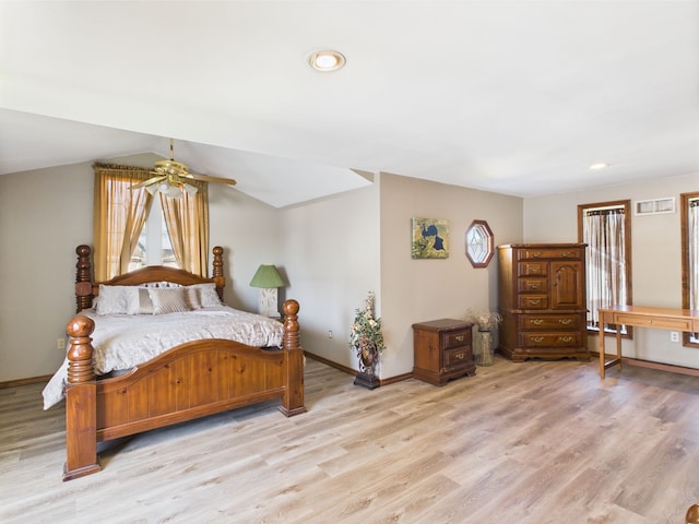 480 Peninsula Dr, Columbiaville, MI 48421 - bedroom featuring wood finished floors, baseboards, recessed lighting, and lofted ceiling
