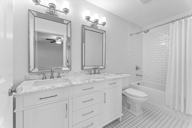 1132 Superior Blvd, Wyandotte, MI 48192 - full bathroom featuring shower / bath combo, a ceiling fan, toilet, and double vanity