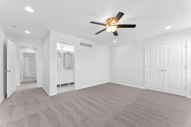 1132 Superior Blvd, Wyandotte, MI 48192 - unfurnished bedroom with carpet flooring, baseboards, recessed lighting, a closet, and ensuite bath