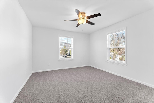1132 Superior Blvd, Wyandotte, MI 48192 - carpeted empty room featuring ceiling fan and baseboards