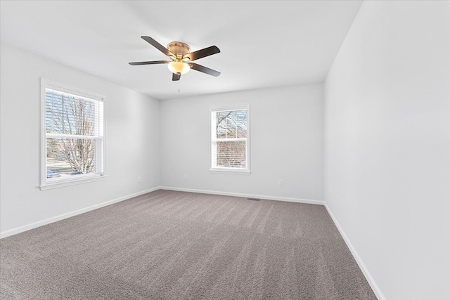 1132 Superior Blvd, Wyandotte, MI 48192 - empty room with a ceiling fan, carpet flooring, and baseboards