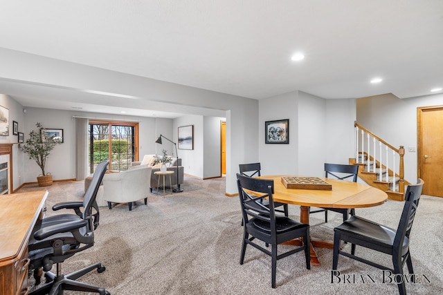 7620 Spring Point Ct NE, Rockford, MI 49341 - dining space featuring light carpet, stairs, recessed lighting, baseboards, and an office area