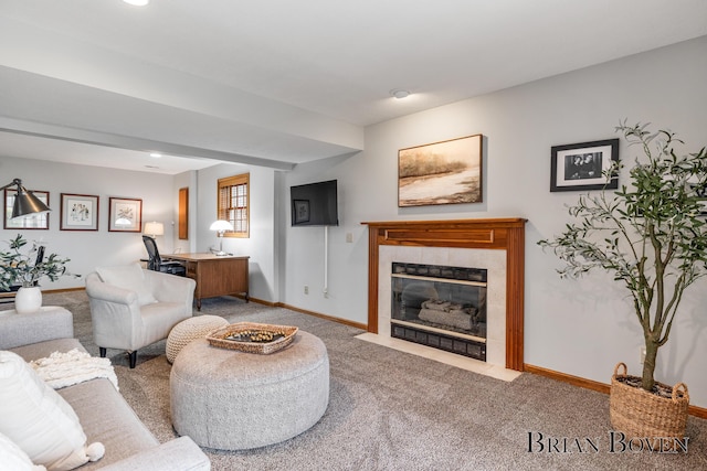 7620 Spring Point Ct NE, Rockford, MI 49341 - living area with carpet, baseboards, a tiled fireplace, and an office area