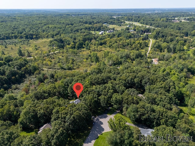 7620 Spring Point Ct NE, Rockford, MI 49341 - aerial view of property's location featuring a heavily wooded area