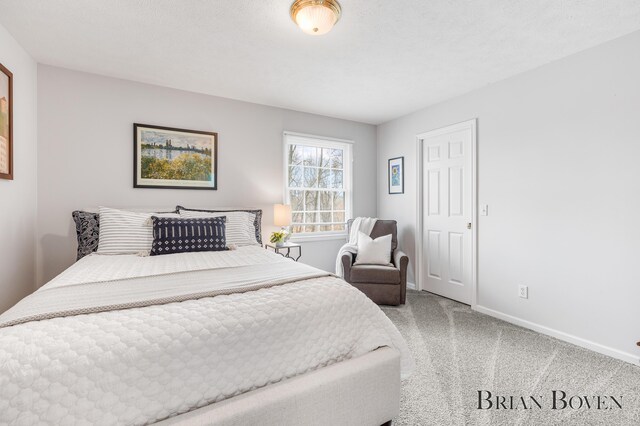 7620 Spring Point Ct NE, Rockford, MI 49341 - bedroom with baseboards and carpet