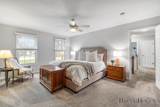 7620 Spring Point Ct NE, Rockford, MI 49341 - bedroom featuring carpet flooring, baseboards, and ceiling fan