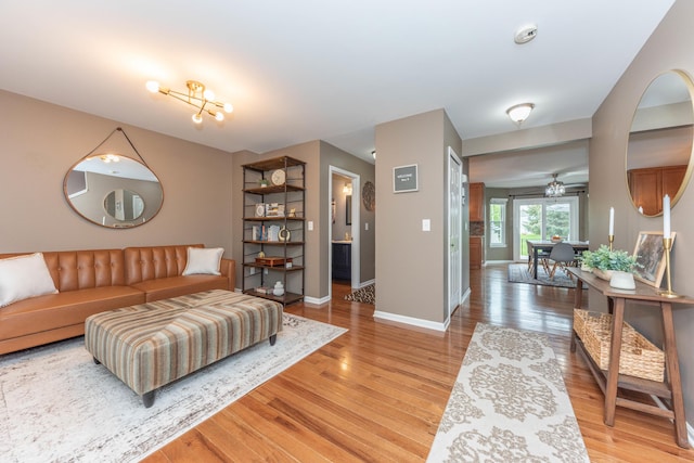 661 Morning Glory Ln, Milan, MI 48160 - living room with light wood-style flooring and baseboards