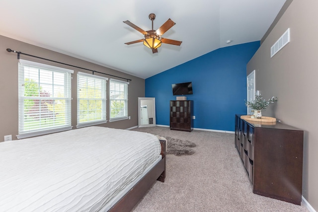 661 Morning Glory Ln, Milan, MI 48160 - carpeted bedroom with lofted ceiling, multiple windows, baseboards, and ceiling fan
