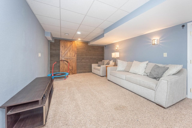 661 Morning Glory Ln, Milan, MI 48160 - living area featuring wooden walls, carpet floors, a paneled ceiling, and recessed lighting
