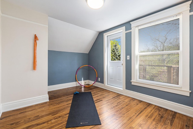 721 W Washington St, Ann Arbor, MI 48103 - exercise room with hardwood / wood-style flooring, baseboards, and lofted ceiling