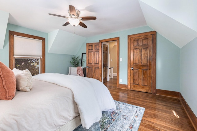 721 W Washington St, Ann Arbor, MI 48103 - bedroom featuring wood finished floors, lofted ceiling, baseboards, and ceiling fan