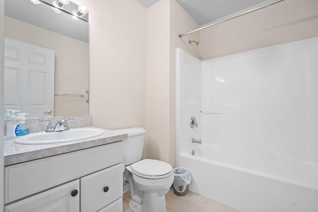full bath with toilet, vanity, shower / washtub combination, and tile patterned flooring