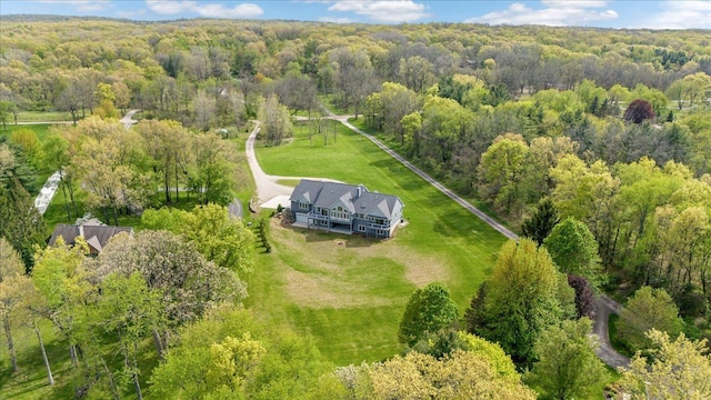 12150 Shaffer Rd, Davisburg, MI 48350 - aerial view of property and surrounding area featuring a heavily wooded area