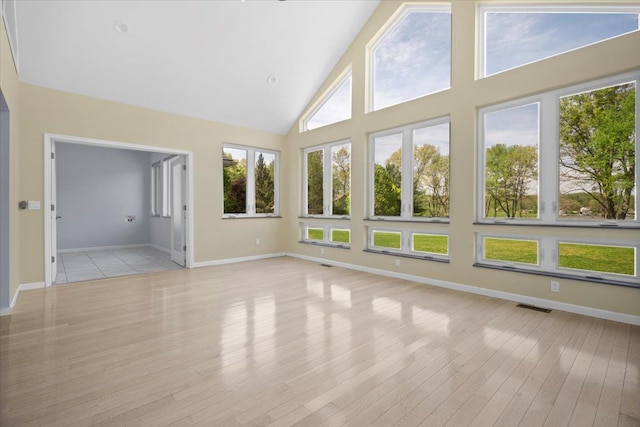 12150 Shaffer Rd, Davisburg, MI 48350 - unfurnished sunroom with lofted ceiling