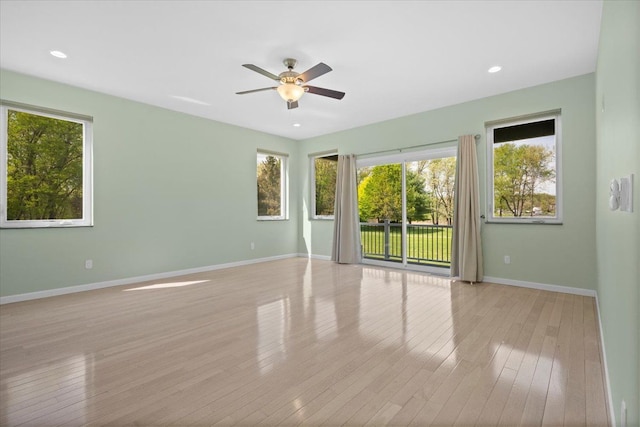 12150 Shaffer Rd, Davisburg, MI 48350 - spare room with plenty of natural light, baseboards, ceiling fan, light wood-style flooring, and recessed lighting