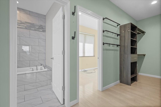 12150 Shaffer Rd, Davisburg, MI 48350 - full bath with tiled tub, baseboards, a shower, recessed lighting, and wood finished floors